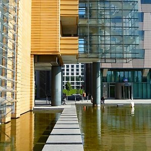 Berlin post modern steel glass building with pool