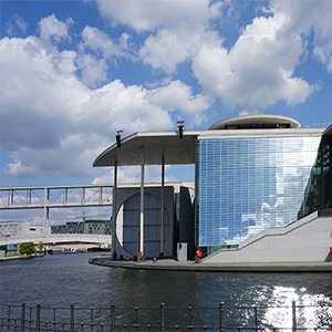Contemporary mirror building location on water in Berlin